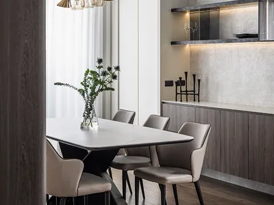 Modern kitchen featuring marble countertops and minimalist design.
