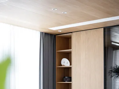 A modern, well-lit home office space featuring modern furniture and a sleek, minimalist design.