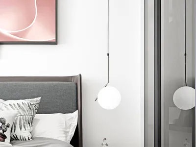 A minimalist bedroom featuring modern lighting and contemporary design elements.