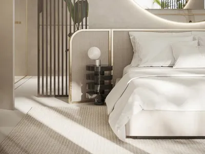 A minimalist bedroom featuring a metal headboard, marble accent wall, and fabric upholstered bed.