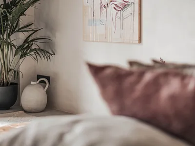Minimalist interior design featuring an art drawing of a child eating ice cream.