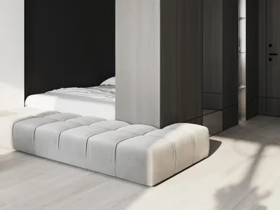 A modern minimalist bedroom with a bed located in a cut-out area of the wall, surrounded by brown wooden panels.