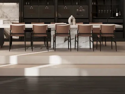 Contemporary kitchen with marble countertops and metallic accents