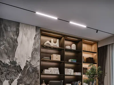 Modern, minimalist home office with wooden desk, bookshelf, and large abstract mural on the wall.