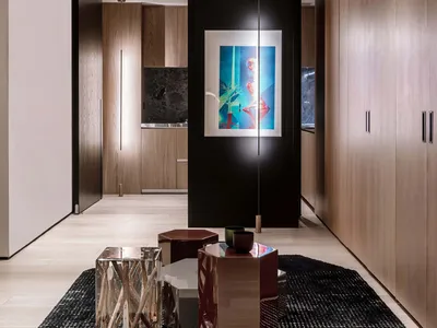 Modern living room featuring Scandinavian design elements with wood, metal, and acrylic materials.