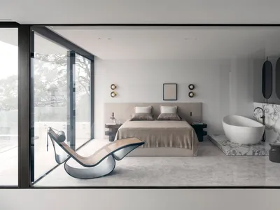 A modern bedroom with a marble floor, a chaise lounge, and a large window overlooking the outdoors.