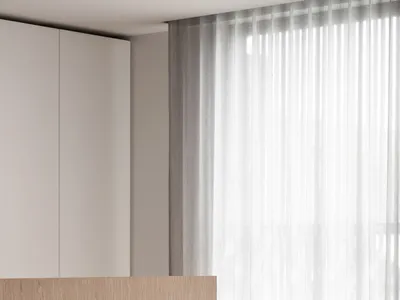 A minimalist bedroom with a wooden bed and glass curtain, featuring a small sculpture and an upholstered headboard.