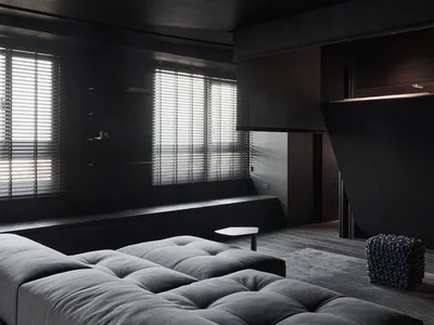Modern minimalist living room with dark leather furniture