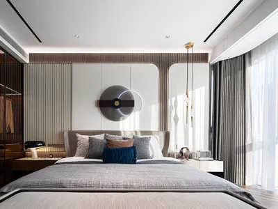 A modern bedroom featuring fabric bedding, metal accents, and wooden elements.
