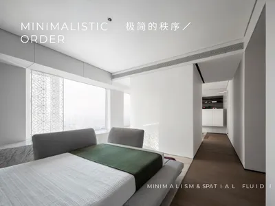 現代簡約臥室，擁有白牆、灰色家具以及綠色毯子。