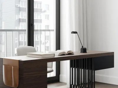 Modern minimalist home office featuring a wooden desk, leather chair, and metal lamp with an open book on the desk.