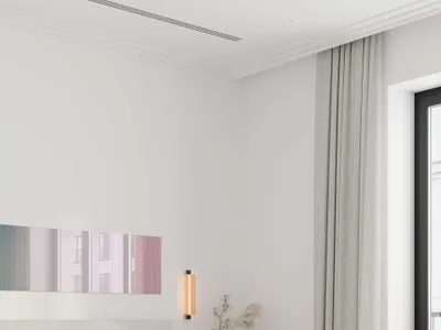 A modern minimalist bedroom featuring a fabric bed and wooden bench.