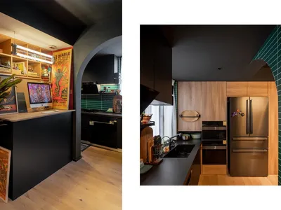 A modern kitchen with wooden cabinets, metal appliances, and glass countertops.