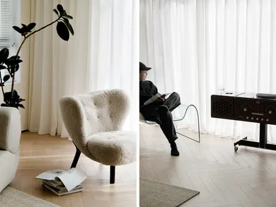 A cozy modern living room features comfortable seating and soft furnishings.