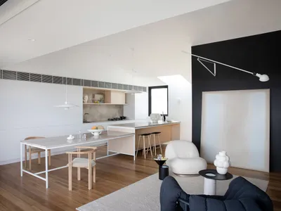 A contemporary residential kitchen with minimalist design features.