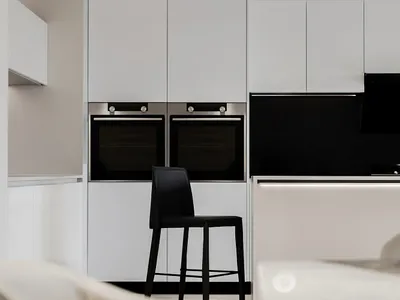 A modern, minimalist kitchen with white high-gloss cabinets and a black backsplash.