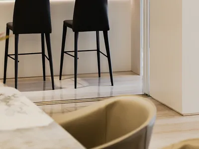A modern minimalist kitchen with black and white color scheme and sleek cabinetry.