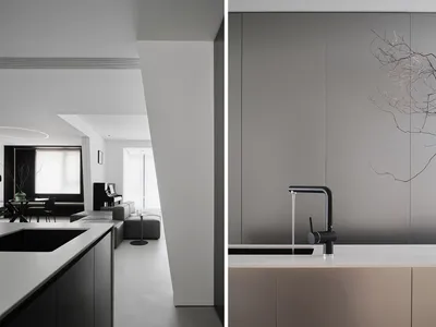 Modern minimalist kitchen featuring concrete countertops and minimalist design elements.