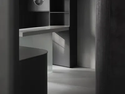 Modern minimalist kitchen with concrete finishes.