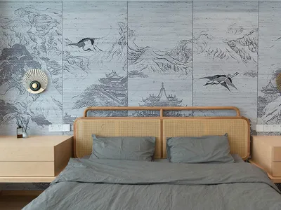 A bedroom with a bed featuring rattan headboard and gray bedding, against a wall with illustrated natural landscapes.