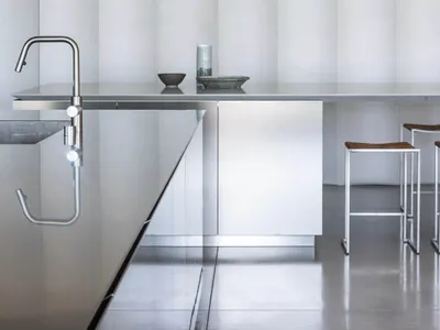 Modern kitchen featuring metallic materials and sleek design