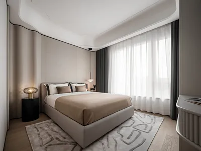 Modern minimalist bedroom featuring fabric bedding on a wooden platform bed under large windows with sheer curtains.