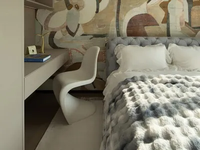 Modern bedroom featuring a textured headboard with a colorful, abstract pattern.