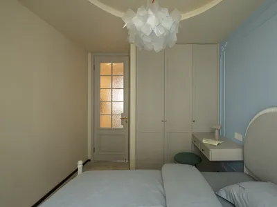 A modern minimalist bedroom with neutral colors and a sleek design.