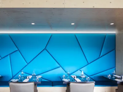 Modern restaurant with blue textured acoustic panels