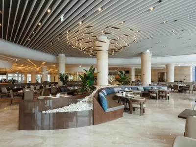 Modern restaurant bar with a concrete floor and ceiling.