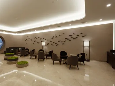現代酒店大廳，展現混凝土與大理石元素。