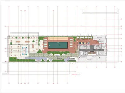 Floor plan of a hotel rooftop deck featuring concrete, glass, metal, and landscaping elements.