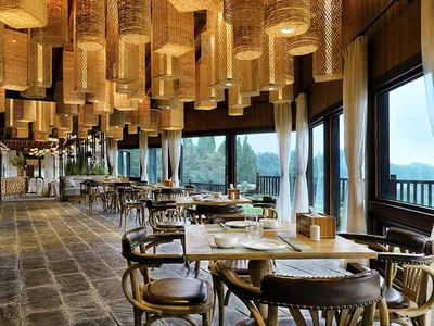 Modern restaurant interior with bamboo lighting fixtures