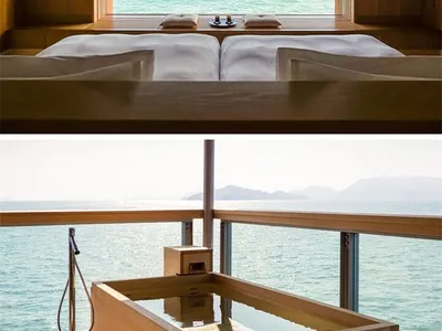 現代臥室擁有海景，極簡設計搭配木質元素