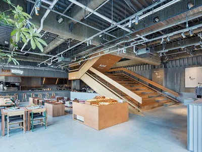 Industrial design restaurant with wooden counter and seating