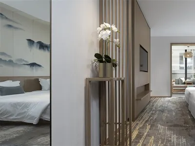 A modern hotel suite featuring white wood, marble, and fabric.