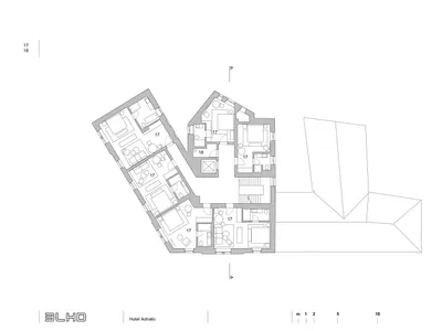 Floor plan of a hotel room layout on white background.