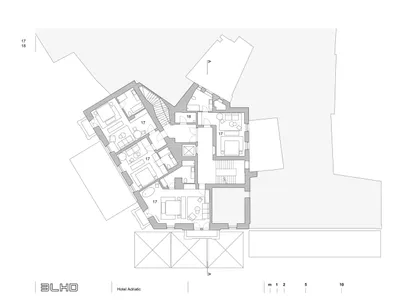A detailed architectural plan of a hotel, showcasing the layout of various floors and rooms.