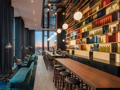A modern restaurant-bar with a wooden counter, leather seating, and glass bottles.