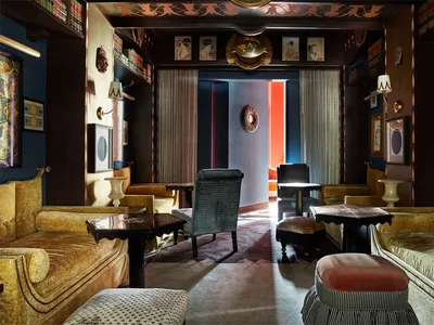 Luxurious hotel lobby featuring plush velvet seating and elegant decor
