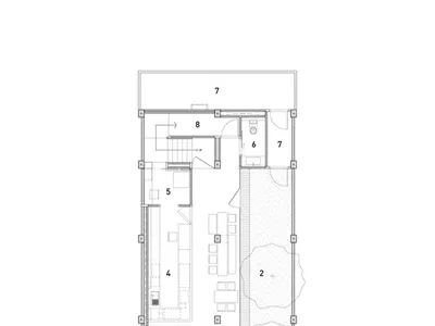 Floor plan of a hotel showing rooms, bathrooms, and service areas.