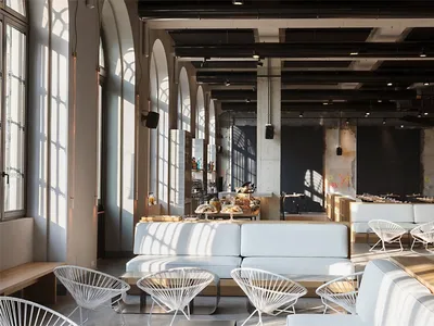 Modern industrial restaurant interior with concrete design elements.