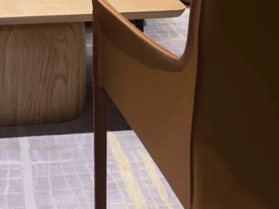 Modern hotel lounge featuring wood, leather, and metal materials
