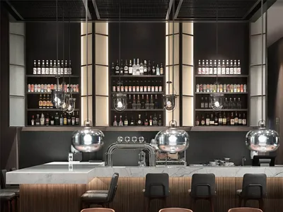 Modern bar interior with metallic lighting and marble counter.
