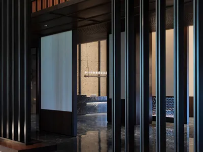 Modern hotel reception with metallic columns and marble flooring