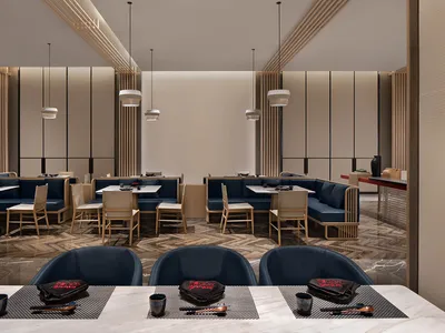 Modern restaurant interior with blue seating and wooden finishes.
