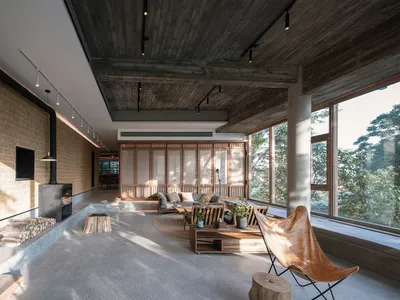 Industrial-style living room featuring concrete walls, a wood-burning stove, and large windows