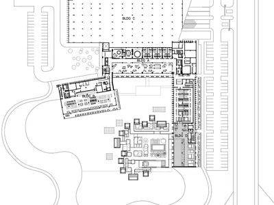 Ground floor plan and master layout of a hotel facility, showing building A, B, C, and D.