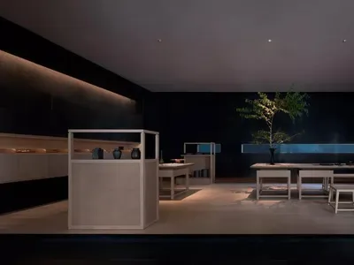 A modern kitchen with wooden and glass elements, featuring a minimalist design.