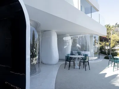 Modern restaurant with glass and concrete exterior and interior design